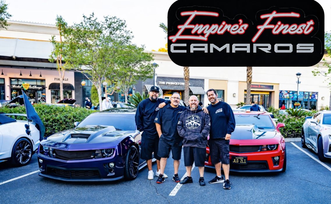 Empires Finest Camaros members posing with custom Camaros